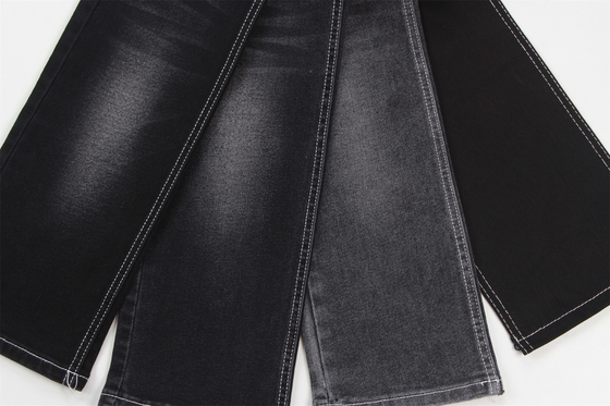 Goedkope prijs 10,5 oz polyester spandex zwart denim met elasticiteit denim stof voor jeans