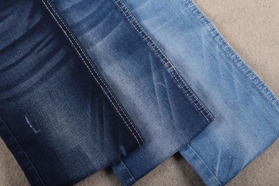 Goede prijs de Rek van Katoenen van 9.7oz 329gsm het Denimstof Polyesterspandex voor de Jeans van het Vrouwenkind online